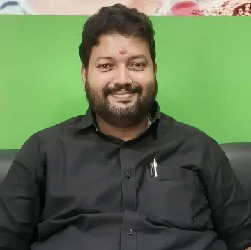 Portrait of Dr. Amal Ram